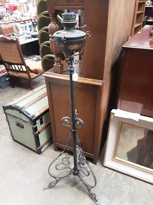 Lot 969 - Early 20th century oil lamp on metal stand