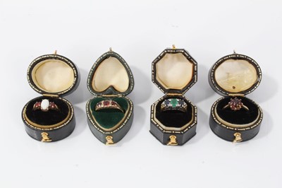 Lot 68 - Four 9ct gold multi gem set dress rings