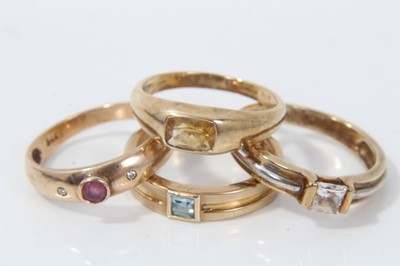 Lot 70 - Four 9ct gold gem set rings