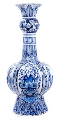 Lot 109 - Very large and impressive late 19th century blue and white Dutch Delft garlic neck vase, painted with flowers and foliate patterns, marked on the base, 86cm height