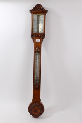 Lot 621 - Late Victorian oak carved barometer