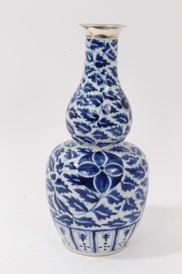Lot 16 - 19th century Chinese porcelain blue and white double gourd shape vase