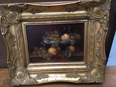 Lot 33 - Pair of Continental school oils on panel - still life of fruit, indistinctly signed, in gilt frames