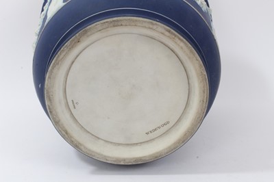 Lot 46 - Large antique Wedgwood dark blue jasper ware jardinière, circa 1890, decorated with classical figures and swags, marks to base, 23cm height x 26cm diameter