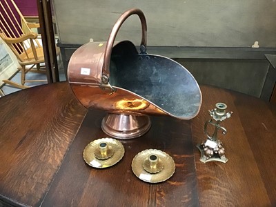 Lot 213 - Copper coal scuttle and three candlesticks