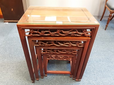 Lot 918 - Good quality Chinese hardwood nest of four tables