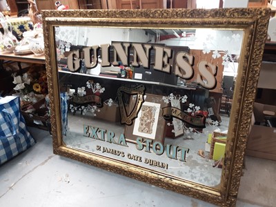 Lot 1061 - Guinness pub mirror in ornate gilt frame, Carlsberg mirror, wall mirror in silvered frame and a pub sign