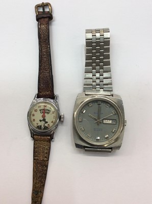 Lot 653 - Bulova stainless steel wristwatch with grey dial and date aperture, together with a vintage Hopalong Cassidy wristwatch on brown leather strap
