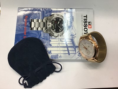 Lot 691 - Gentlemen's Tissot Calender wristwatch, model number T063637, in circular case on expandable bracelet, with instruction Calendar
