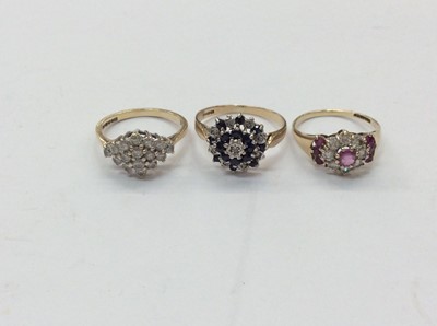 Lot 666 - Three 9ct gold gem set cluster rings