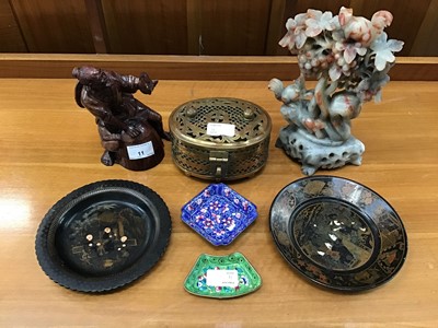 Lot 11 - Oriental soapstone and resin carved figures, together with two lacquered papier-mâché dishes and other oriental items