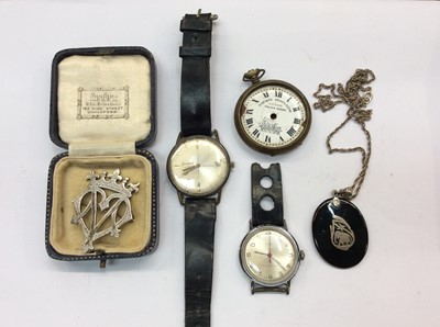 Lot 675 - Silver monogram brooch, silver mounted pendant, pocket watch and two vintage wristwatches