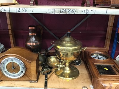 Lot 512 - Assorted brassware and metalware, including a brass urn, Indian and Egyptian items, and other items to include two clocks, a carved pipe rack, etc