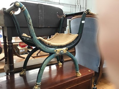 Lot 879 - Regency style Egyptian revival painted and parcel gilt X frame stool/window seat
