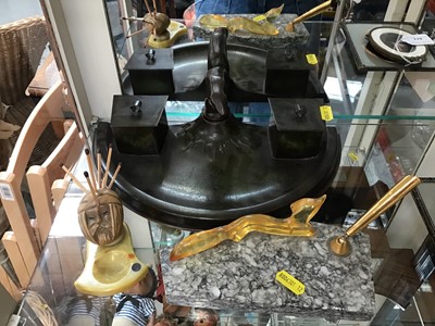 Lot 75 - Vintage Art Deco fox-form Bakelite and marble pen holder, Bakelite mask-form match holder, and a Danish Ildfast Bronce inkstand with glass liners (3)