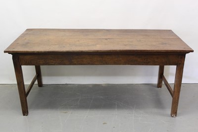 Lot 1288 - 18th/19th century continental chestnut farmhouse table with plank top on square supports and end stretchers 174cm x 78cm