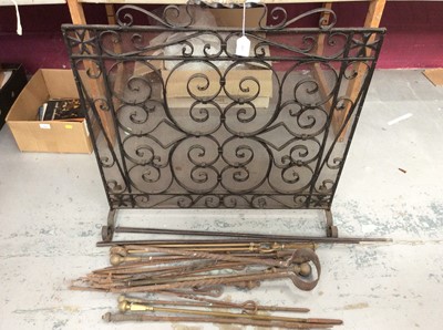 Lot 443 - Black metal fire guard and a selection of fire irons