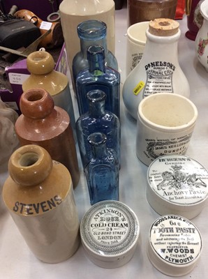 Lot 454 - Group of 19th Century stoneware bottles, blue glass poison bottles and others