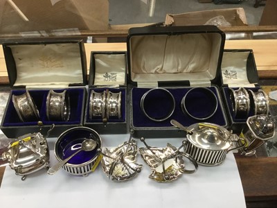 Lot 690 - 4 sets of Silver napkin rings, silver mustard, salt and shaker, and further silver plated items