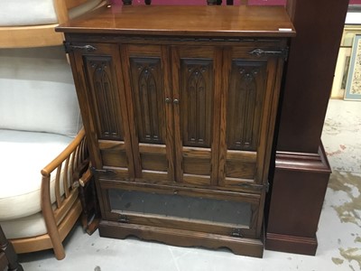 Lot 855 - Old Charm oak television cabinet with gothic decoration 83cm wide, 107cm high