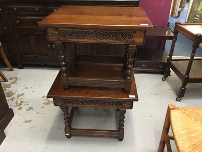 Lot 857 - Pair Old Charm oak occasional tables on bobbin legs joined by stretchers 61cm wide and carved oak two tier trolley (3)