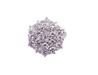 Lot 428 - Diamond cluster ring with a large cluster of 19 brilliant cut diamonds in tiered claw setting on 18ct white gold shank. Estimated total diamond weight approximately 3.80cts.