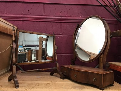 Lot 514 - Two mahogany dressing table stands with swivel mirrors