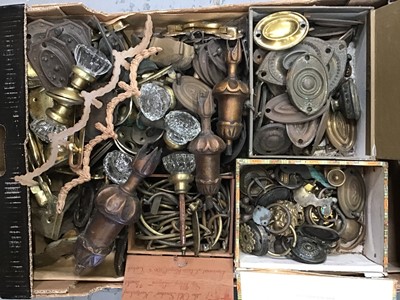 Lot 519 - Box of brass door furniture and cabinet fittings