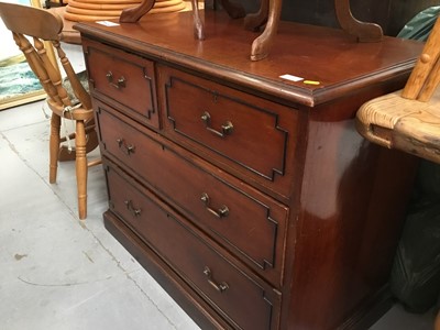 Lot 874 - Edwardian mahogany chest with two short and two long drawers