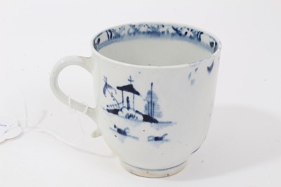 Lot 56 - 18th century Lowestoft blue and white porcelain cup and saucer, c. 1775, decorated with chinoiserie pattern, painter's mark inside footrim of cup