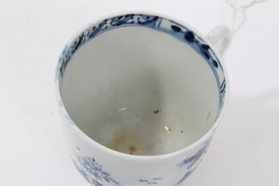 Lot 56 - 18th century Lowestoft blue and white porcelain cup and saucer, c. 1775, decorated with chinoiserie pattern, painter's mark inside footrim of cup