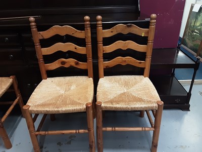 Lot 884 - Set of four pine chairs with rush seats