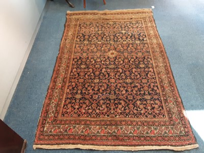 Lot 888 - Eastern rug with geometric decoration on red, blue and beige ground