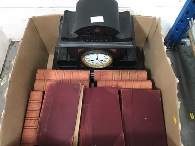 Lot 84 - Black slate mantel clock with key together with antique Charles Dickens novels with leather binding