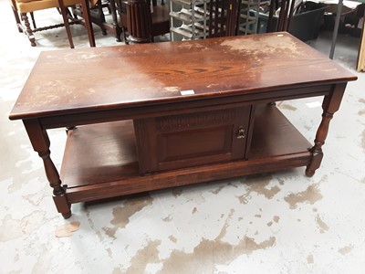Lot 24 - Old Charm style oak coffee table with cupboard below 106cm wide, 50cm deep, 47cm high