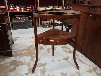 Lot 915 - Georgian mahogany corner washstand with single drawer