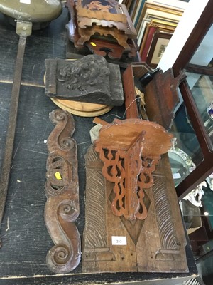 Lot 213 - Pine wall bracket together with carved oak fragments and other antique carving
