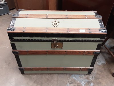 Lot 933 - Green painted iron and wooden bound dome top trunk