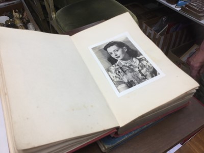 Lot 353 - An album of film stars, some with facsimile signatures, together with an album of stamps