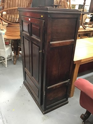 Lot 952 - 18th c. Panelled oak cupboard enclosed by panel door (live woodworm to top and back) - 84cm wide, 47cm deep, 138cm high