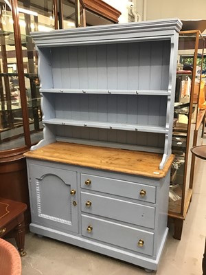 Lot 974 - Blue painted pine two height dresser with open shelves and cupboard below