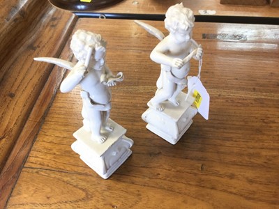 Lot 311 - Pair of Continental porcelain figures of Chrubs