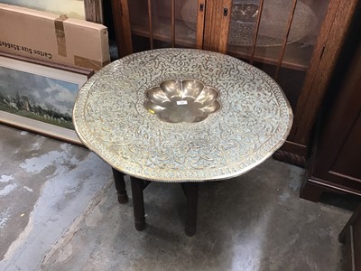 Lot 966 - Brass Benares table on folding stand