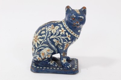 Lot 174 - Late 19th century Swiss Thoune pottery cat money box