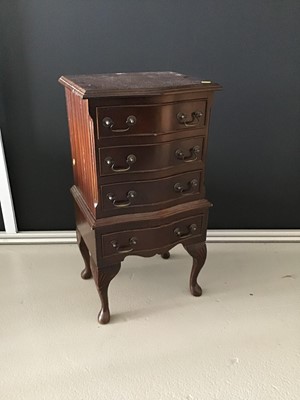 Lot 14 - Reproduction mahogany bedside chest of four...