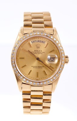 Lot 603 - Gentlemens Rolex 18ct gold Day Date wristwatch with after-market diamond bezel, model number 18078, serial number 5307244