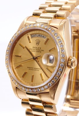 Lot 603 - Gentlemens Rolex 18ct gold Day Date wristwatch with after-market diamond bezel, model number 18078, serial number 5307244
