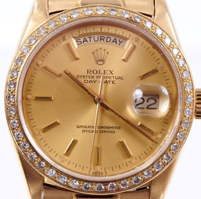 Lot 603 - Gentlemens Rolex 18ct gold Day Date wristwatch with after-market diamond bezel, model number 18078, serial number 5307244