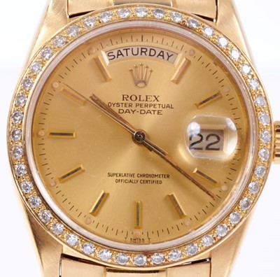Lot 603 - Gentlemens Rolex 18ct gold Day Date wristwatch with after-market diamond bezel, model number 18078, serial number 5307244