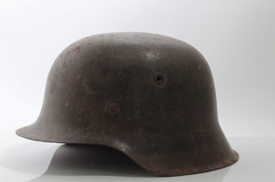 Lot 679 - Second World War Nazi M42 Pattern helmet with steel head band and information about the original owner on paper slip